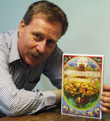 The author holding Book 3 in his series. The author holding Book 3 in his series.