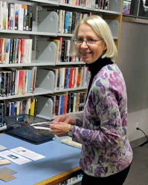 Giving a slide show at the local library Giving a slide show at the local library